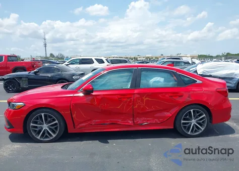 2023 Honda Civic Touring z USA, uszkodzony, nr VIN 2HGFE1F94PH323451